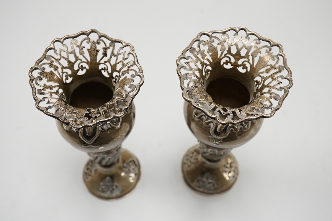 A pair of Edwardian pierced silver spill vases, by William Hutton & Sons, Ltd, London, 1902, height 15.7cm, 8.5oz.